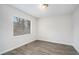 Cozy bedroom featuring neutral tones, wood-look floors, and a bright window at 4962 Preswick Ne Ct, Marietta, GA 30066