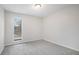 Bedroom with plush carpet, neutral walls and a window with blinds at 4962 Preswick Ne Ct, Marietta, GA 30066