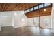 Bright living room with vaulted wood ceilings, new flooring, and a seamless open-concept design at 4962 Preswick Ne Ct, Marietta, GA 30066