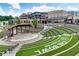 Beautiful outdoor amphitheater showcasing tiered seating and a performance stage, nestled in a vibrant community setting at 1236 Ainsworth Aly # 37, Sugar Hill, GA 30518