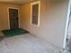 View of interior of carport with door and window at 1767 Thomas St, Decatur, GA 30032