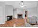 Living room featuring a fireplace, hardwood floors, and cozy seating area at 182 Noah Dr, Rockmart, GA 30153