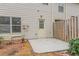 Backyard featuring a small patio, door to the home, vinyl siding, and a partial fence at 2890 Ridgeview Sw Dr, Atlanta, GA 30331