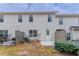 Exterior view of the back of the home showing the patio and fenced yard at 2890 Ridgeview Sw Dr, Atlanta, GA 30331