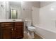 Cozy bathroom featuring a vanity with a mirror, toilet, and a tub/shower combination at 2890 Ridgeview Sw Dr, Atlanta, GA 30331