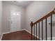 Bright foyer features hardwood floors, white trim, and a staircase at 2890 Ridgeview Sw Dr, Atlanta, GA 30331