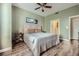 This bedroom offers a neutral color scheme, wood floors, and a comfortable bed, creating a serene retreat at 2626 Peachtree Nw Rd # 804, Atlanta, GA 30305