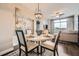 Dining area with round table and chairs located near the living area at 2626 Peachtree Nw Rd # 804, Atlanta, GA 30305