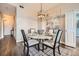 Dining area with round table and chairs plus a view into the hallway and living area at 2626 Peachtree Nw Rd # 804, Atlanta, GA 30305