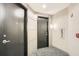 Hallway view of unit doors with carpet flooring and neutral colored walls at 2626 Peachtree Nw Rd # 804, Atlanta, GA 30305
