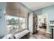 Chic kitchen with stainless steel refrigerator, light gray cabinets, and a window seat at 2626 Peachtree Nw Rd # 804, Atlanta, GA 30305