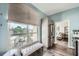 Bright kitchen with stainless steel refrigerator and a window with a view of the outside at 2626 Peachtree Nw Rd # 804, Atlanta, GA 30305