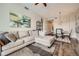 Open living area with a sectional sofa, wood floors, and dining area at 2626 Peachtree Nw Rd # 804, Atlanta, GA 30305