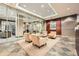 Lobby featuring neutral armchairs, recessed lighting, and glass enclosed rooms at 2626 Peachtree Nw Rd # 804, Atlanta, GA 30305