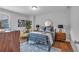 Cozy bedroom featuring a queen bed, nightstands, and a comfortable chair at 129 Old Alabama Se Rd, Emerson, GA 30137