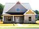 Charming two-story home with a combination of brick and gray siding, complemented by well-manicured landscaping at 129 Old Alabama Se Rd, Emerson, GA 30137