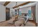Tranquil main bedroom suite with barn doors, natural light, and neutral decor at 129 Old Alabama Se Rd, Emerson, GA 30137