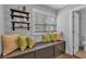 Inviting reading nook with a window, comfortable cushions and shelves at 129 Old Alabama Se Rd, Emerson, GA 30137