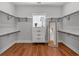 Organized walk-in closet with custom shelving, drawers, and natural light from a window at 129 Old Alabama Se Rd, Emerson, GA 30137