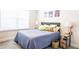 Bedroom with a bed, window, and decor at 2882 Cadence Walk Rd, Atlanta, GA 30360