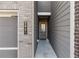 Charming entryway features a covered entrance and modern exterior design at 2882 Cadence Walk Rd, Atlanta, GA 30360