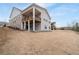 Great house exterior with a covered porch, brick and traditional siding on a large lot at 3750 Montebello Pkwy, Cumming, GA 30028
