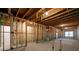 Spacious unfinished basement with wooden framework, insulation, and potential for customization at 3750 Montebello Pkwy, Cumming, GA 30028