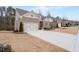 Beautiful brick home with two-car garage, long driveway, and well-kept lawn at 3750 Montebello Pkwy, Cumming, GA 30028