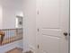 Hallway shot with stairs and door that show the house's design at 3750 Montebello Pkwy, Cumming, GA 30028