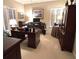 Spacious home office featuring traditional wooden furniture and natural light from shuttered windows at 962 Manor Parc Dr, Decatur, GA 30033