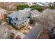 Aerial view of home featuring a charming front porch and well-manicured front yard at 1602 Windsor Walk, Avondale Estates, GA 30002
