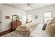 A bright bedroom features hardwood floors, neutral decor, and ample natural light, creating a relaxing retreat at 1602 Windsor Walk, Avondale Estates, GA 30002