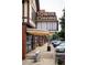 Shot showcasing the exterior and sidewalk area of a local Cinema at 1602 Windsor Walk, Avondale Estates, GA 30002