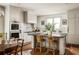 Open kitchen with granite countertops and a breakfast bar with seating at 1602 Windsor Walk, Avondale Estates, GA 30002