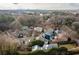 Aerial shot showcasing the neighborhood's tree-lined streets and skyline view at 1602 Windsor Walk, Avondale Estates, GA 30002