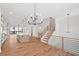 Open concept kitchen featuring hardwood floors and a large kitchen island at 3462 Dryden Se Ln, Vinings, GA 30339