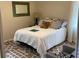 Cozy bedroom featuring a patterned rug and comfortable bed, creating a relaxing and inviting atmosphere at 4033 Louise St, Powder Springs, GA 30127