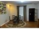 Inviting dining room with a round table, elegant rug, and ample space for Gathering gatherings at 4033 Louise St, Powder Springs, GA 30127