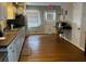 Functional kitchen with ample cabinet space and updated appliances, perfect for meal preparation at 4033 Louise St, Powder Springs, GA 30127