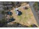 Aerial view displaying the property's boundaries of 3.23 acres, home and garage at 1650 Old Loganville Rd, Loganville, GA 30052