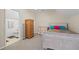 Cozy bedroom with neutral walls, carpet flooring, and an ensuite bathroom at 1650 Old Loganville Rd, Loganville, GA 30052