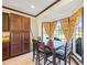 Cozy breakfast nook with a table, chairs, and bright windows overlooking the yard at 1650 Old Loganville Rd, Loganville, GA 30052