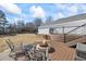 Large deck with a firepit, providing a great space for outdoor gatherings and relaxation at 1650 Old Loganville Rd, Loganville, GA 30052