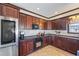 Well-equipped kitchen with stainless steel appliances, granite countertops, and ample cabinet space at 1650 Old Loganville Rd, Loganville, GA 30052