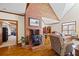 Inviting living room showcasing brick fireplace with wood stove and hardwood floors at 1650 Old Loganville Rd, Loganville, GA 30052