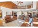 Open living room featuring wood accents, hardwood floors and an open staircase to second floor at 1650 Old Loganville Rd, Loganville, GA 30052