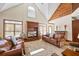 Bright living room with vaulted ceiling, wood accents, and built in entertainment center at 1650 Old Loganville Rd, Loganville, GA 30052