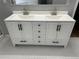 Bathroom vanity featuring double sinks, shaker style cabinets, and black and white mosaic tile floor at 1666 Hearthstone Way, Jonesboro, GA 30236