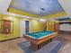 Finished basement with a pool table under a cloud-painted ceiling at 1000 Eddie Craig Dr, Mcdonough, GA 30252