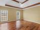 Spacious bedroom with hardwood floors and ample natural light at 1000 Eddie Craig Dr, Mcdonough, GA 30252